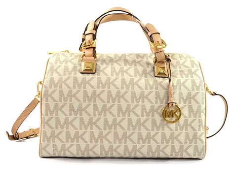 does michael kors grayson satchel is made with leather|Michael Kors leather satchel large.